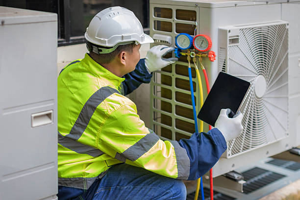 Professional Ac Installation technician working in New Douglas, IL